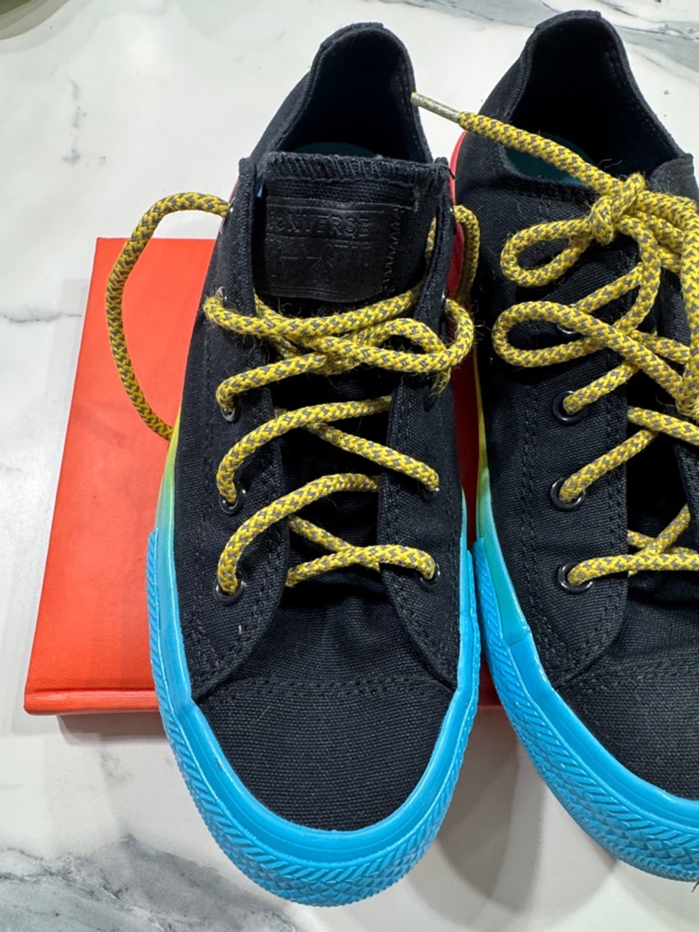 Converse Kids Black Canvas Sneakers with Blue Soles and Yellow Laces